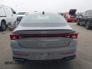 2023 Kia K5 GT-Line z VIN 5XXG64J27PG199321, wystawiony jako IAAI lot #42153677 z przebiegiem 28 798 mil mil oraz . Historia ofert i sprzedaży dostępna na DreamBid. Obrazek 16.