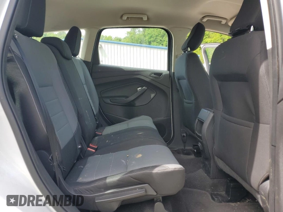 2018 Ford Escape S with VIN 1FMCU0F79JUB26918, listed as a Copart auction lot 56510775 with 184,176 mi miles and Salvage title. Bid and sale history available at DreamBid. Image 11.