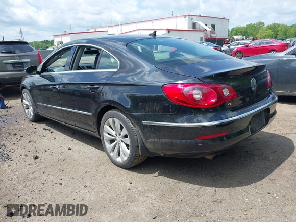 2011 Volkswagen CC Sport with VIN WVWMP7AN8BE709541, listed as a IAAI auction lot 42164892 with 154,547 mi miles. Bid and sale history available at carsss.com. Image 3.