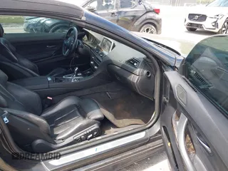 2014 BMW M6 z VIN WBSLZ9C52EDZ78748, wystawiony jako IAAI lot #42152435 z przebiegiem 57 150 mil mil oraz . Historia ofert i sprzedaży dostępna na DreamBid. Obrazek 5.