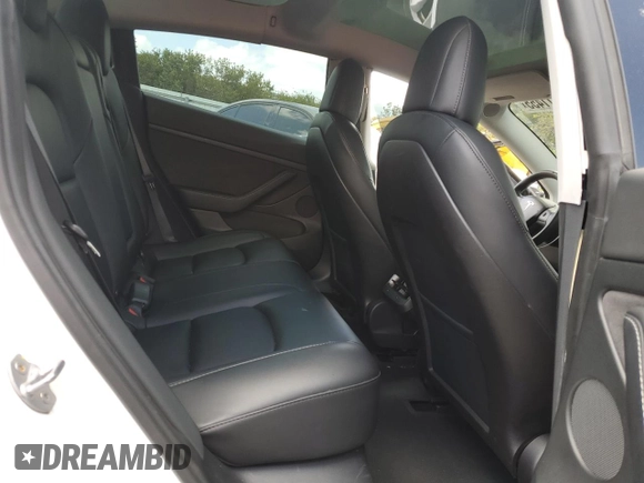 2021 Tesla Model 3 Standard Range Plus with VIN 5YJ3E1EA2MF985463, listed as a Copart auction lot 53311455 with 23,176 mi miles and Clean Title. Bid and sale history available at DreamBid. Image 10.