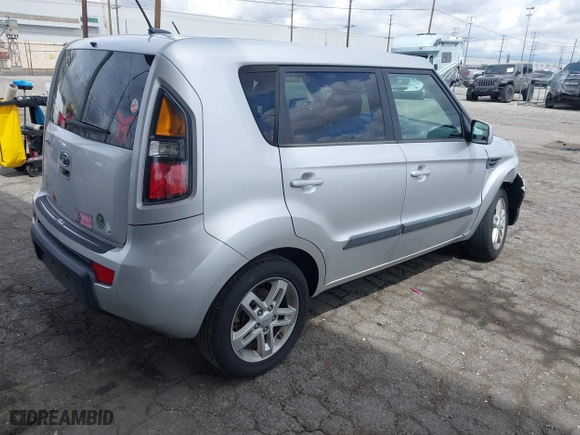 2011 Kia Soul + with VIN KNDJT2A22B7706579, listed as a IAAI auction lot 41921442 with 162,383 mi miles. Bid and sale history available at carsss.com. Image 4.