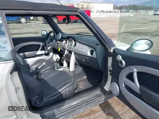 2006 MINI Convertible with VIN WMWRF33566TF65410, listed as a IAAI auction lot 40813052 with 131,109 mi miles and . Bid and sale history available at DreamBid. Image 5.