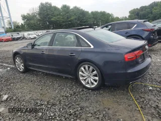 2018 Audi A8 with VIN WAU44AFD0JN000152, listed as a Copart auction lot 62844254 with 47,325 mi miles and Salvage title. Bid and sale history available at DreamBid. Image 2.