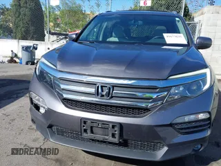 2017 Honda Pilot EX-L with VIN 5FNYF6H57HB021350, listed as a IAAI auction lot 41673635 with 101,980 mi miles and . Bid and sale history available at DreamBid. Image 12.