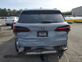 2024 BMW X5 xDrive40i z VIN 5UX23EU07R9U24113, wystawiony jako Copart lot #50386895 z przebiegiem 38 407 mil mil oraz Szkody całkowita. Historia ofert i sprzedaży dostępna na DreamBid. Obrazek 6.