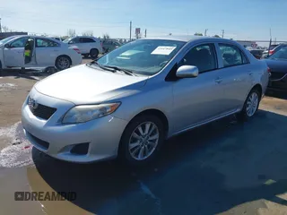 2010 Toyota Corolla with VIN 1NXBU4EE5AZ260859, listed as a IAAI auction lot 41647848 with 129,074 mi miles and . Bid and sale history available at DreamBid. Image 2.