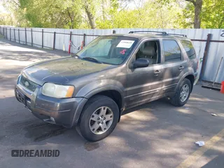 2003 Ford Escape Limited with VIN 1FMCU94173KB02067, listed as a IAAI auction lot 42088659 with 236,209 mi miles. Bid and sale history available at carsss.com. Image 2.