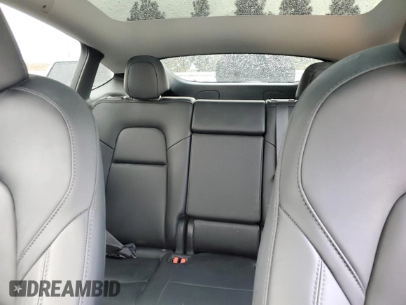 2024 Tesla Model Y with VIN 7SAYGDED1RF052031, listed as a Copart auction lot 48507865 with 5,365 mi miles and Salvage title. Bid and sale history available at DreamBid. Image 10.