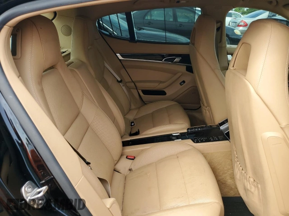 2015 Porsche Panamera S E-Hybrid z VIN WP0AD2A76FL041627, wystawiony jako Copart lot #63190924 z przebiegiem 88 860 mil mil oraz Szkody całkowita. Historia ofert i sprzedaży dostępna na DreamBid. Obrazek 10.