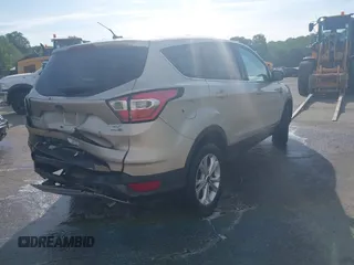 2017 Ford Escape SE with VIN 1FMCU9GD1HUC70823, listed as a IAAI auction lot 41898457 with 86,042 mi miles and . Bid and sale history available at DreamBid. Image 4.