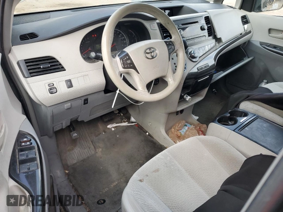 2014 Toyota Sienna LE with VIN 5TDJK3DC4ES085384, listed as a Copart auction lot 60375125 with 81,696 mi miles and Salvage title. Bid and sale history available at DreamBid. Image 8.