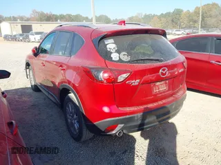 2015 Mazda CX-5 Touring with VIN JM3KE4CY6F0455468, listed as a IAAI auction lot 40669780 with 225,831 mi miles and . Bid and sale history available at carsss.com. Image 3.