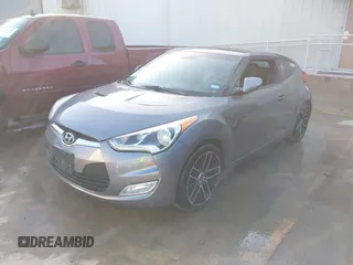 2013 Hyundai Veloster w/Black Int with VIN KMHTC6AD2DU158889, listed as a IAAI auction lot 41878065 with 157,450 mi miles and . Bid and sale history available at DreamBid. Image 2.