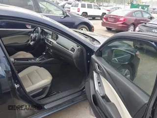 2016 Mazda Mazda6 i Touring with VIN JM1GJ1V59G1402867, listed as a IAAI auction lot 41998212 with 135,724 mi miles. Bid and sale history available at carsss.com. Image 5.