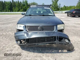 2004 Volkswagen Passat GLS with VIN WVWPD63B44P054997, listed as a Copart auction lot 60442705 with 238,851 mi miles and Salvage title. Bid and sale history available at DreamBid. Image 5.