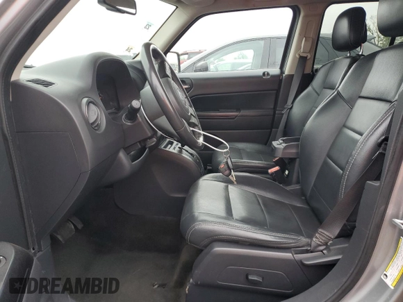 2015 Jeep Patriot High Altitude with VIN 1C4NJRFB2FD396806, listed as a Copart auction lot 57651155 with 130,357 mi miles and Salvage title. Bid and sale history available at DreamBid. Image 7.