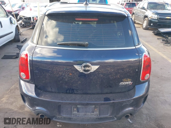 2013 MINI Countryman S with VIN WMWZC3C52DWP21475, listed as a IAAI auction lot 41215334 with 124,365 mi miles and . Bid and sale history available at DreamBid. Image 17.