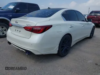 2019 Infiniti Q50 Luxe with VIN JN1EV7AP4KM510863, listed as a IAAI auction lot 42251042 with 54,156 mi miles and . Bid and sale history available at DreamBid. Image 4.