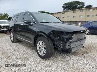 2024 Cadillac XT6 FWD Luxury z VIN 1GYKPAR41RZ734536, wystawiony jako Copart lot #46669655 z przebiegiem 11 916 mil mil oraz Szkoda całkowita • Salvage title. Historia ofert i sprzedaży dostępna na DreamBid. Obrazek 4.
