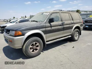 1998 Mitsubishi Montero z VIN JA4LS31PXWP014289, wystawiony jako Copart lot #68752234 z przebiegiem 189 886 mil mil oraz Tytuł czysty. Historia ofert i sprzedaży dostępna na DreamBid. Obrazek 1.