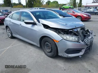 2017 Honda Civic LX with VIN 2HGFC2F5XHH562089, listed as a IAAI auction lot 42010207 with 99,809 mi miles and . Bid and sale history available at DreamBid. Image 1.