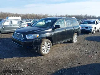 2009 Toyota Highlander Hybrid Limited with VIN JTEEW44A792035677, listed as a IAAI auction lot 41429153 with 110,001 mi miles. Bid and sale history available at carsss.com. Image 2.