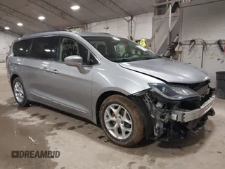 2017 Chrysler Pacifica Touring L with VIN 2C4RC1BG7HR831320, listed as a IAAI auction lot 41805697 with 137,743 mi miles and . Bid and sale history available at DreamBid. Image 1.