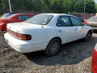 1992 Toyota Camry z VIN 4T1VK12E0NU015172, wystawiony jako Copart lot #58974095 z przebiegiem 210 163 mil mil oraz Szkoda całkowita • Salvage title. Historia ofert i sprzedaży dostępna na DreamBid. Obrazek 3.