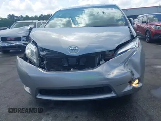 2015 Toyota Sienna XLE with VIN 5TDYK3DC5FS685735, listed as a IAAI auction lot 42139229 with 87,694 mi miles and . Bid and sale history available at DreamBid. Image 6.