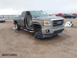 2014 GMC Sierra 1500 SLE with VIN 1GTV2UEC0EZ322425, listed as a IAAI auction lot 41433098 with 137,501 mi miles. Bid and sale history available at carsss.com. Image 1.