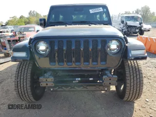 2021 Jeep Wrangler Unlimited Sahara High Altitude with VIN 1C4HJXEG7MW537997, listed as a Copart auction lot 74322054 with 60,226 mi miles and Salvage title. Bid and sale history available at DreamBid. Image 5.