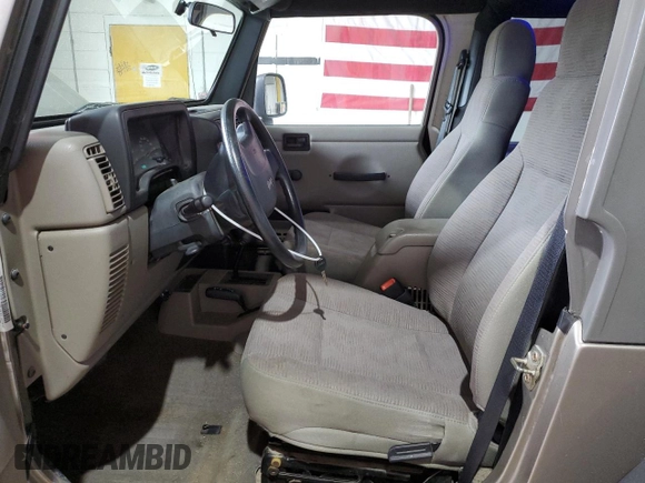2005 Jeep Wrangler Sport z VIN 1J4FA49S75P325028, wystawiony jako Copart lot #56942315 z przebiegiem 169 988 mil mil oraz Szkoda całkowita • Salvage title. Historia ofert i sprzedaży dostępna na DreamBid. Obrazek 7.