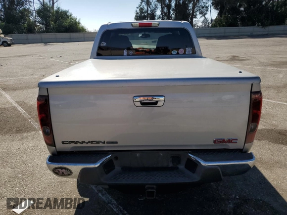 2010 GMC Canyon SLE1 with VIN 1GTDSCDE2A8146535, listed as a Copart auction lot 75571244 with 0 mi miles and Salvage Title. Bid and sale history available at carsss.com. Image 6.