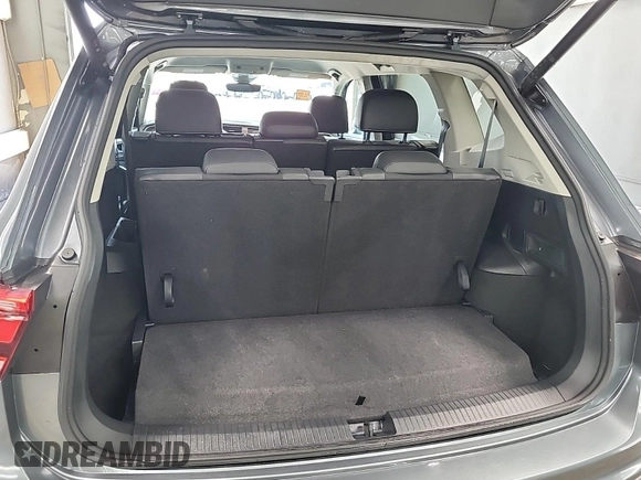 2024 Volkswagen Tiguan SE with VIN 3VV3B7AX5RM107598, listed as a IAAI auction lot 42796418 with 25,762 mi miles and . Bid and sale history available at DreamBid. Image 4.