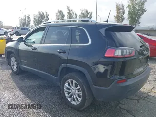 2019 Jeep Cherokee Latitude with VIN 1C4PJLCB8KD215423, listed as a IAAI auction lot 41911882 with 76,965 mi miles. Bid and sale history available at carsss.com. Image 3.