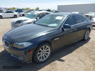 2014 BMW 5 Series 535i with VIN WBA5B1C51ED483069, listed as a IAAI auction lot 41945334 with 135,871 mi miles. Bid and sale history available at carsss.com. Image 2.