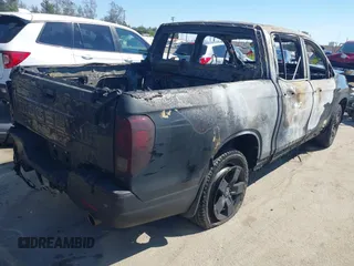 2024 Honda Ridgeline Black Edition with VIN 5FPYK3F89RB015601, listed as a IAAI auction lot 41880308 with Not provided miles and . Bid and sale history available at DreamBid. Image 4.