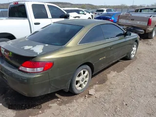 1999 Toyota Solara SE with VIN 2T1CF22PXXC247611, listed as a IAAI auction lot 41863240 with 153,823 mi miles. Bid and sale history available at carsss.com. Image 4.