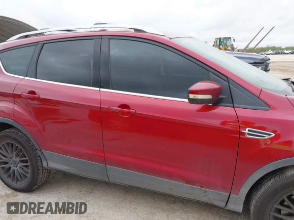 2013 Ford Escape Titanium with VIN 1FMCU0J9XDUD90999, listed as a IAAI auction lot 42373924 with 179,477 mi miles and . Bid and sale history available at DreamBid. Image 13.