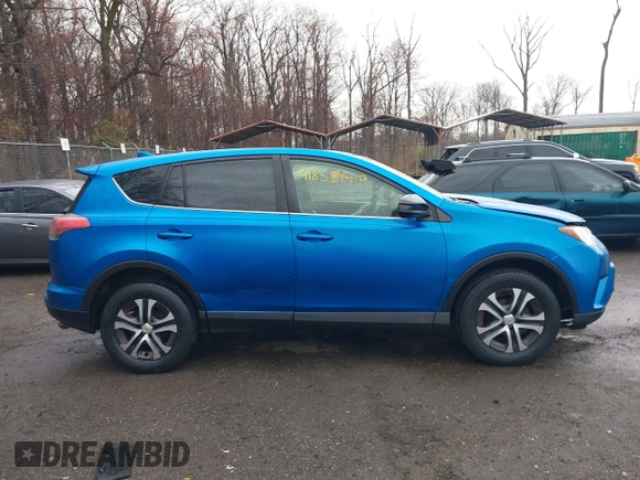 2016 Toyota RAV4 LE with VIN JTMBFREV9GJ100635, listed as a IAAI auction lot 41858669 with 171,644 mi miles. Bid and sale history available at carsss.com. Image 13.