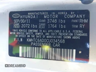 2012 Hyundai Veloster w/Gray Int with VIN KMHTC6AD0CU034568, listed as a IAAI auction lot 41460659 with 141,826 mi miles and . Bid and sale history available at DreamBid. Image 9.