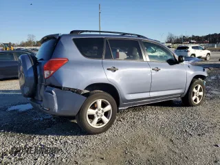 2006 Toyota RAV4 with VIN JTMBK35V065011522, listed as a Copart auction lot 84474234 with 132,896 mi miles and Salvage Title. Bid and sale history available at carsss.com. Image 3.