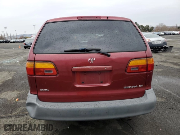 1999 Toyota Sienna CE z VIN 4T3GF19C7XU154663, wystawiony jako Copart lot #85240854 z przebiegiem 197 962 mil mil oraz Szkoda całkowita • Salvage title. Historia ofert i sprzedaży dostępna na DreamBid. Obrazek 6.