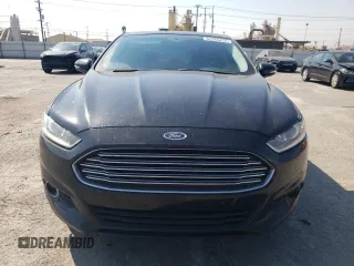 2014 Ford Fusion SE Hybrid with VIN 3FA6P0LUXER296906, listed as a Copart auction lot 62265414 with 135,332 mi miles and Salvage title. Bid and sale history available at DreamBid. Image 5.