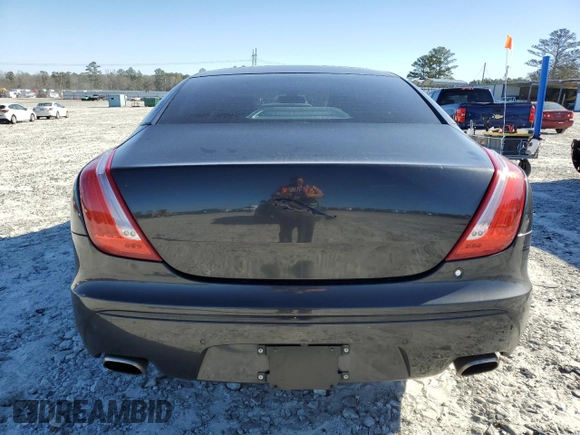 2012 Jaguar XJ with VIN SAJWA1CB1CLV31450, listed as a Copart auction lot 46883875 with 150,268 mi miles and Salvage Title. Bid and sale history available at DreamBid. Image 6.