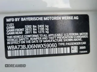 2022 BMW 5 Series 540i xDrive with VIN WBA73BJ06NWX59060, listed as a Copart auction lot 52142645 with 33,678 mi miles and Salvage title. Bid and sale history available at DreamBid. Image 12.