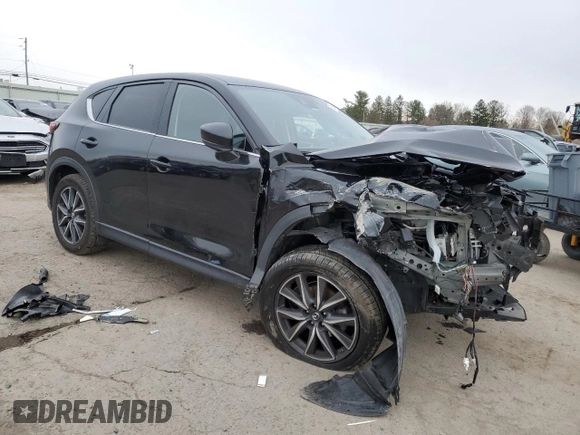 2017 Mazda CX-5 Grand Touring with VIN JM3KFBDL0H0194037, listed as a Copart auction lot 50365495 with 96,829 mi miles and Salvage Title. Bid and sale history available at carsss.com. Image 4.
