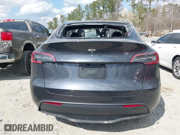 2025 Tesla Model Y Long Range with VIN 7SAYGDED3SA352138, listed as a IAAI auction lot 41760798 with 1,209 mi miles and . Bid and sale history available at DreamBid. Image 15.