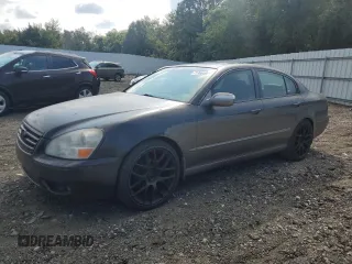 2005 Infiniti Q45 z VIN JNKBF01A45M100941, wystawiony jako Copart lot #71366494 z przebiegiem 117 616 mil mil oraz Tytuł czysty. Historia ofert i sprzedaży dostępna na DreamBid. Obrazek 1.